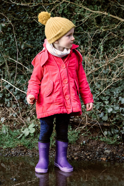 girl in purple warm wellies